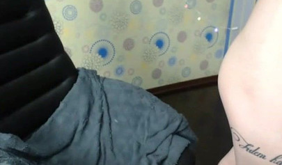 Tattoed brunette teen wearing socks pleases her tight pussy with toys on camera