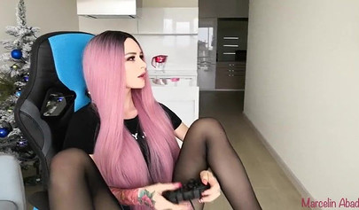 Teen with pink hair and buttplug gets her gaming session interrupted and fucked