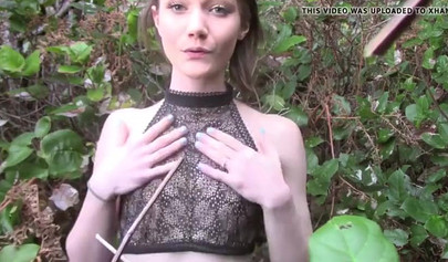 Skinny teen slut masturbates in woods