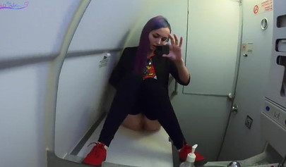 Horny amateur slut with big tits masturbates in airplane