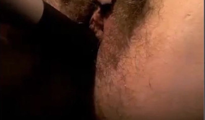 Sexy chick toying her hairy pussy with big black dildo