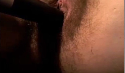 Sexy chick toying her hairy pussy with big black dildo