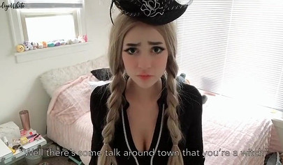 Busty blonde cosplay chick Indigo White plays with big fake cock