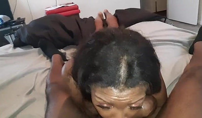 Ebony slut gagging big stiff cock and eats cum