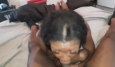Ebony slut gagging big stiff cock and eats cum