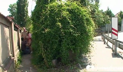 Outdoor threesome with amateur brunette teen