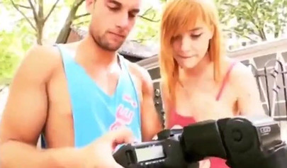 Redhead teen takes photographer's big cock in her slimy pussy