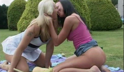 Horny lesbians toying their anal holes outdoors