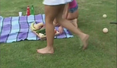 Horny lesbians toying their anal holes outdoors