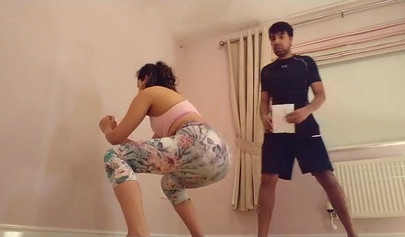 Asian whore with big ass kneels and gets her pussy pleasured by a horny dude