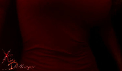 Slutty MILF Xev Bellringer releases her big tits from laced bra