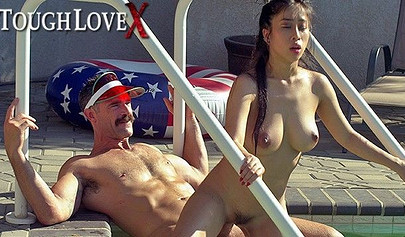 Busty Asian Jade Kush rides Charles Dera's dick pool side