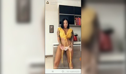 Busty tattooed Latina enjoys solo masturbation while because she's home alone