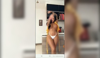 Busty tattooed Latina enjoys solo masturbation while because she's home alone