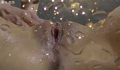 After stripping and masturbating this Japanese bitch takes big dick between her legs