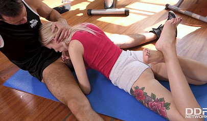 Small titted Dee Dee gives lovely footjob and then fucks in gym