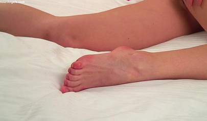 Black haired petite teen enjoys herself while stripping