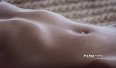 Petite Lilit A enjoys erotic massage on the beach