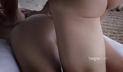 Petite Lilit A enjoys erotic massage on the beach