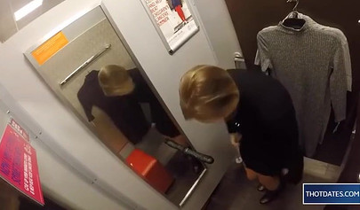 Hot blonde babe sticking her rubber dildo in pussy in dressing room