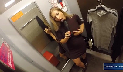 Hot blonde babe sticking her rubber dildo in pussy in dressing room