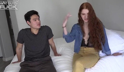 Long haired redhead with small tits takes it from behind