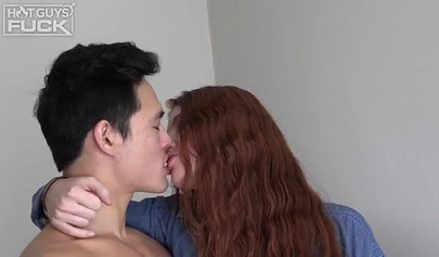 Long haired redhead with small tits takes it from behind