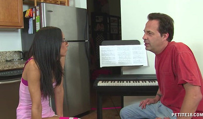Petite chick Tia Cyrus seduces her piano teacher and fucks him hard