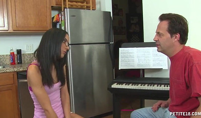 Petite chick Tia Cyrus seduces her piano teacher and fucks him hard