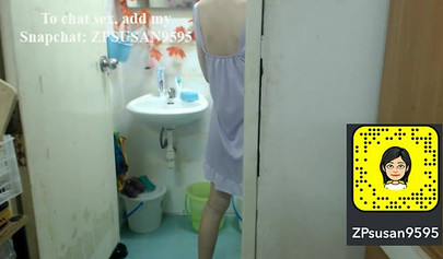 Amateur babe with hairy pussy spied in the bathroom