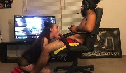 Lucky dude receives a deepthroat blowjob while playing games
