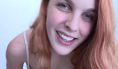 Spanish redhead slut Amarna Miller rubbing her pussy in solo action