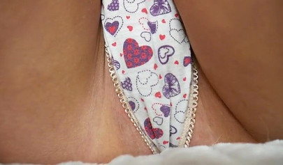 Blonde with huge fake tits and ass showing her skills on a dildo