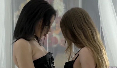 Russian lesbian babes Jacqueline Summers and Sheri Vi in erotic action