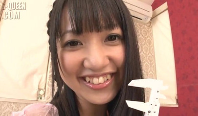 Petite Japanese girl plays with her pussy and toys it with a glass dildo