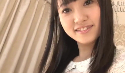 Petite Japanese girl plays with her pussy and toys it with a glass dildo