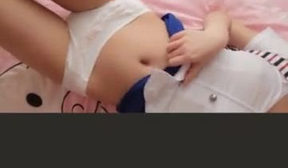 Amateur Asian girl takes off pantyhose and rubs her shaved pussy