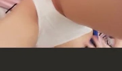 Amateur Asian girl takes off pantyhose and rubs her shaved pussy