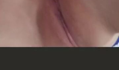 Amateur Asian girl takes off pantyhose and rubs her shaved pussy