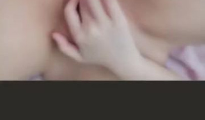 Amateur Asian girl takes off pantyhose and rubs her shaved pussy