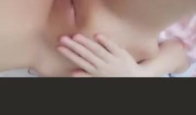 Amateur Asian girl takes off pantyhose and rubs her shaved pussy