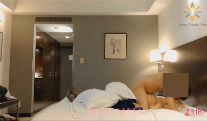 Busty blonde hooker fucking with her client in the hotel room