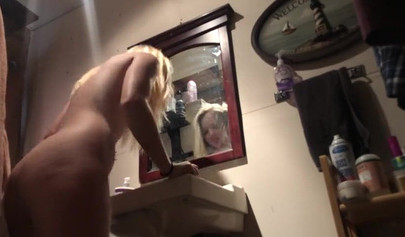 Voyeur cam caught gorgeous blonde babe nude in the bathroom