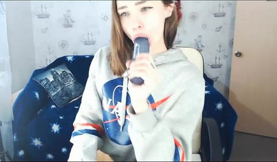 Beautiful Russian webcam model teasing and masturbating with dildo