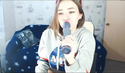 Beautiful Russian webcam model teasing and masturbating with dildo