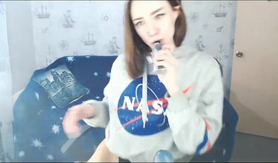 Beautiful Russian webcam model teasing and masturbating with dildo