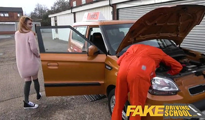 Slutty redhead seduces black mechanic guy and fucks him in a car