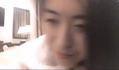 Cute Asian girl teasing and masturbating at home on webcam