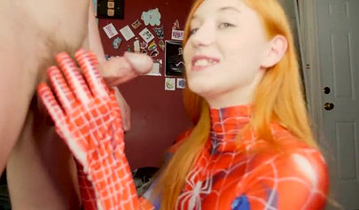 Sexy ginger in spiderman costume gives deepthroat blowjob