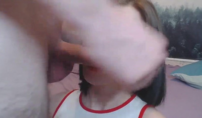 Petite Russian brunette deepthroating a big cock on webcam